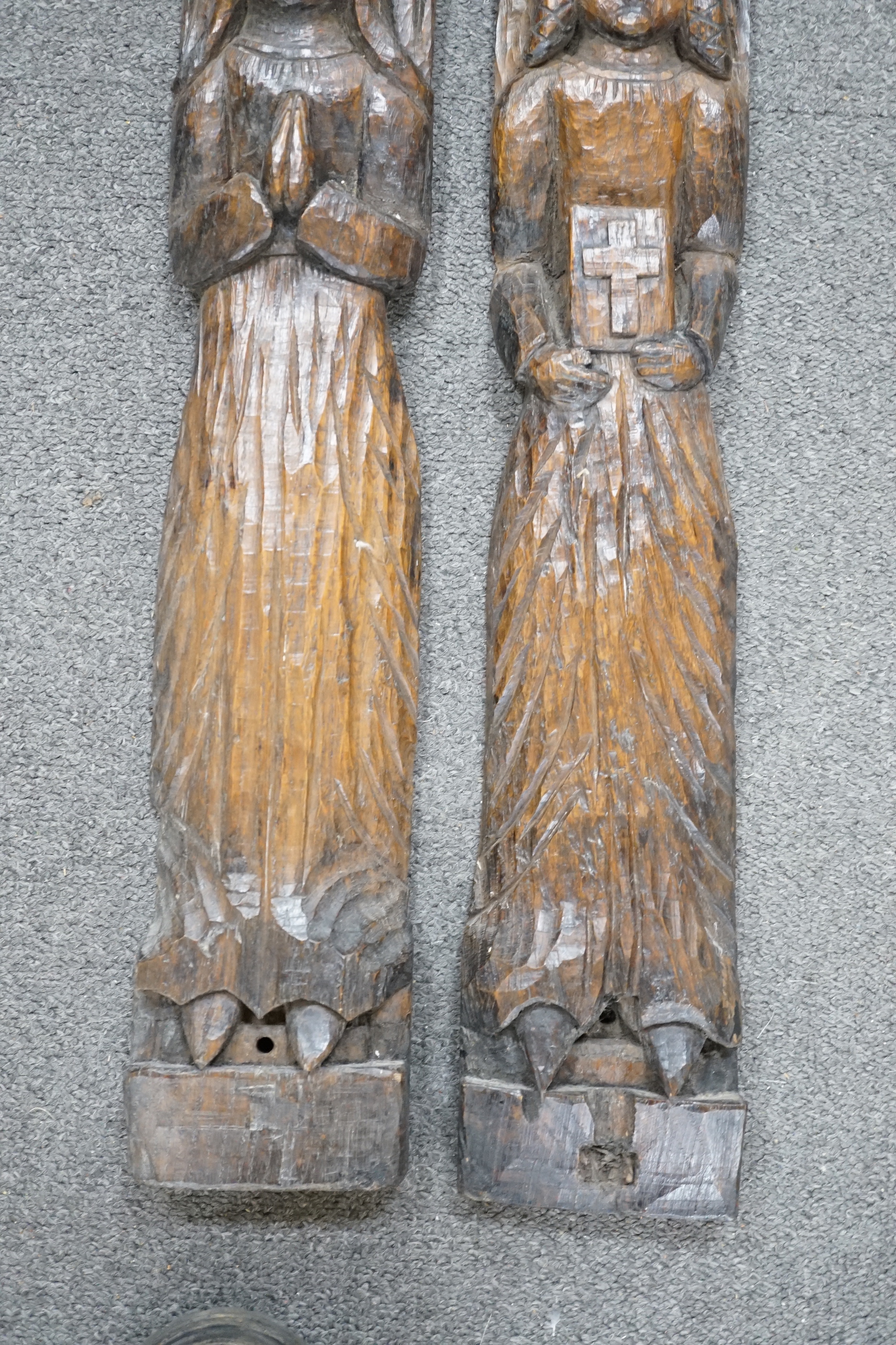 Two 19th century, oak carvings, religious figures, 67cm high